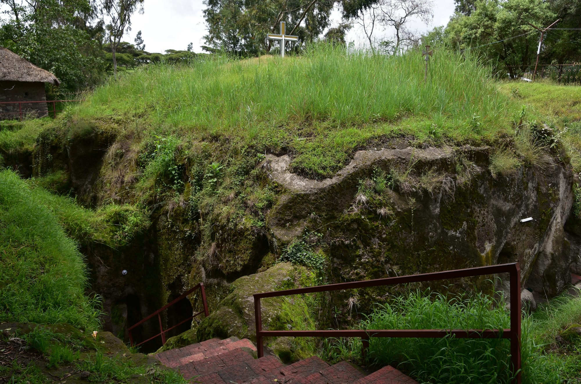 Rock-hewn worship site, local guide etiquette, and heritage photography